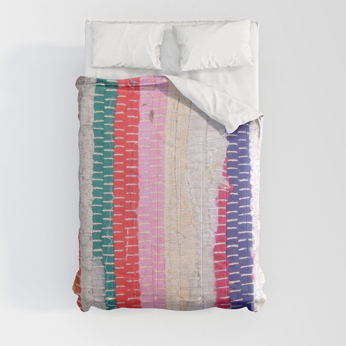 Ethnic stitch textile in multiple colours. Comforter