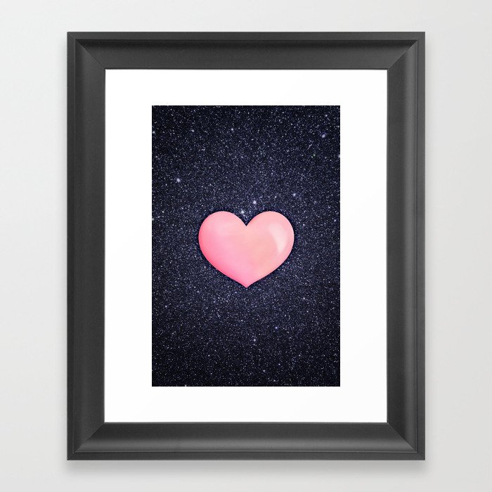 Pink heart on shiny black Framed Art Print