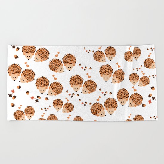 Hedgehogs in autumn Beach Towel