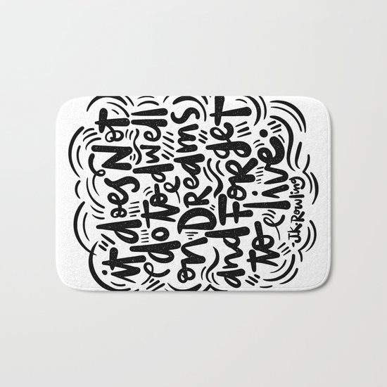 do not dwell on dreams... Bath Mat