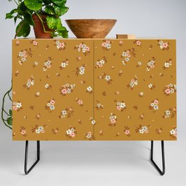 Vintage floral background. Floral pattern with small pastel color flowers on a yellow mustard background. Seamless pattern. Ditsy style. Stock vintage illustration.  Credenza
