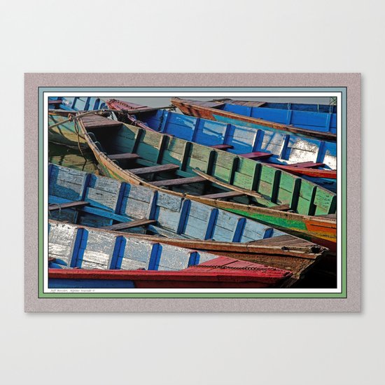 COLORFUL CANOES ALONG PHEWA LAKE SHORELINE POKHARA NEPAL Canvas Print