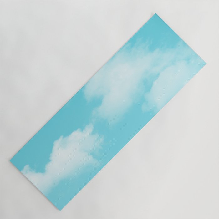 Cute puffy small white clouds on a sunny aqua blue sky Yoga Mat