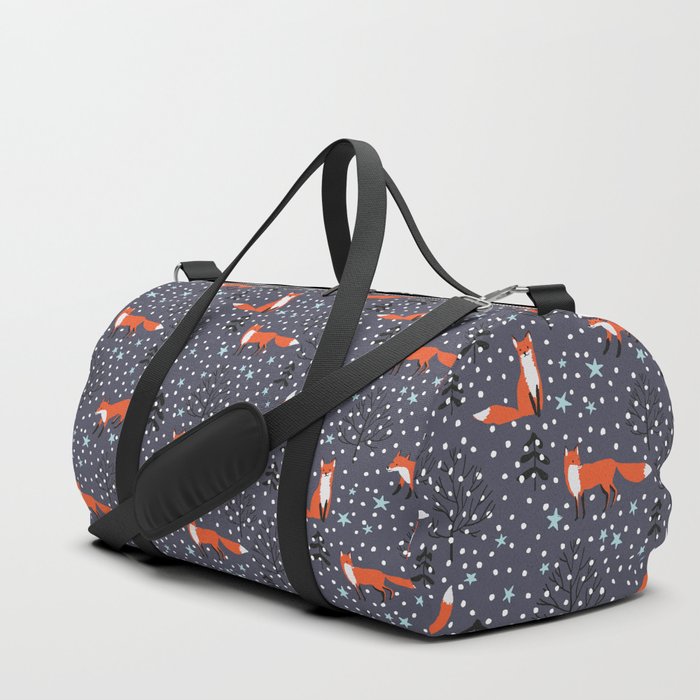 Red foxes in the nignt winter forest Duffle Bag