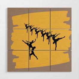 Ballerina figures in black on orange brush stroke Wood Wall Art