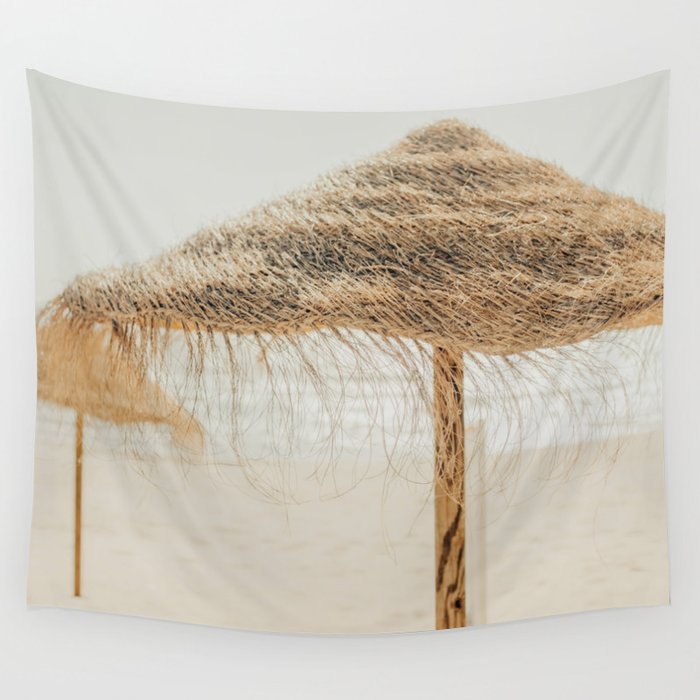 Beach Dreams III - straw beach umbrellas photography by Ingrid Beddoes Wall Tapestry