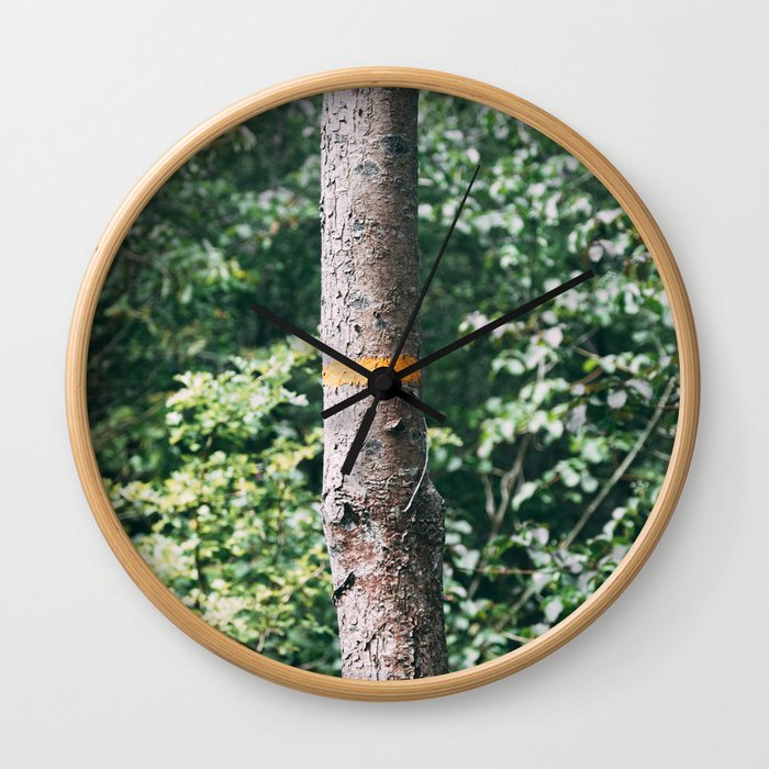 the yellow line on the tree Wall Clock