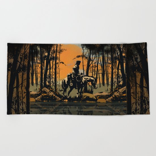 in the evening Beach Towel