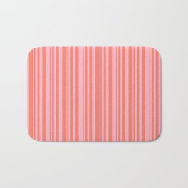 [ Thumbnail: Salmon and Light Pink Colored Lined Pattern Bath Mat ]