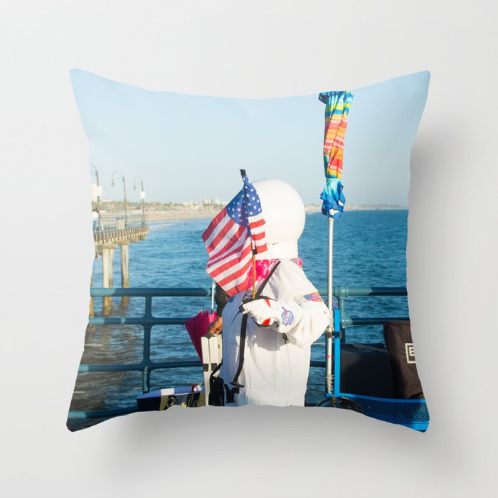 cosmonaut Santa Monica pier Throw Pillow