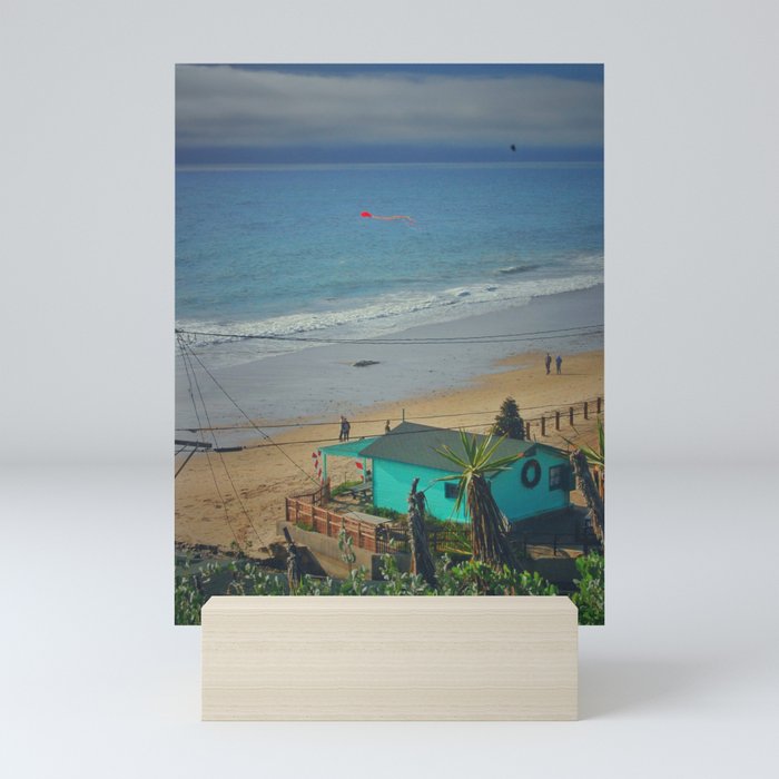 The teal house on the beach Mini Art Print