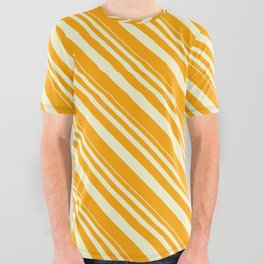 [ Thumbnail: Light Yellow and Orange Colored Lined Pattern All Over Graphic Tee ]