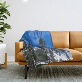 Tree line in a blue sky Throw Blanket