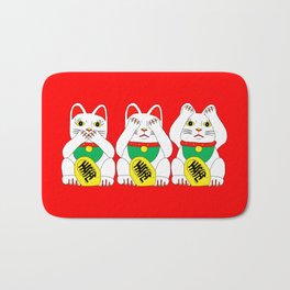 Three Wise Lucky Cats on Red Badematte