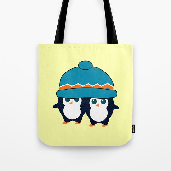 When two cute penguins find a beanie Tote Bag