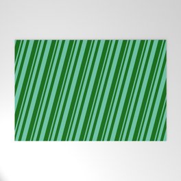 [ Thumbnail: Aquamarine and Dark Green Colored Pattern of Stripes Welcome Mat ]