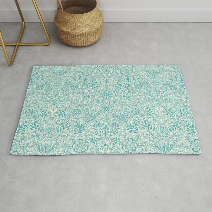 Detailed Floral Pattern in Teal and Cream Rug by micklyn | Society6