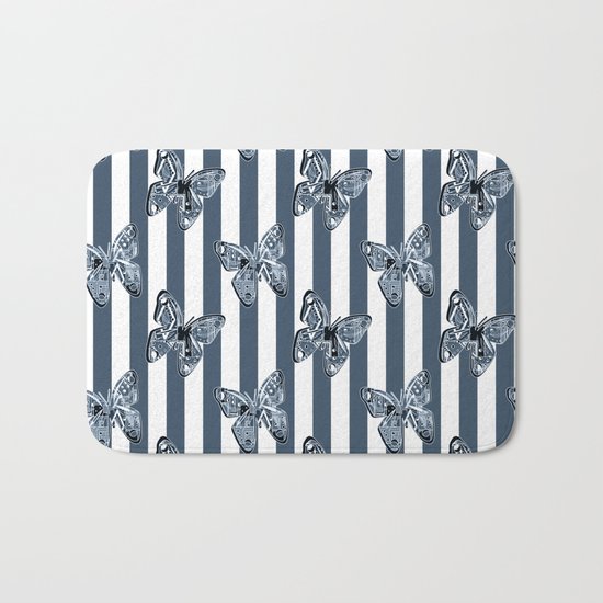 Blue butterflies on a striped background . Bath Mat