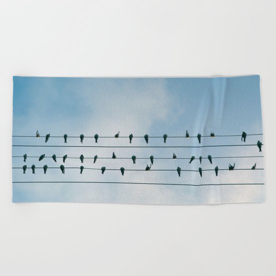 Birds on a wire Beach Towel