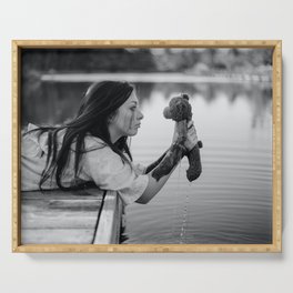 School daze; girl pulling childhood teddy bear out of lake breakup relationship female black and white photograph - photography - photographs Serving Tray
