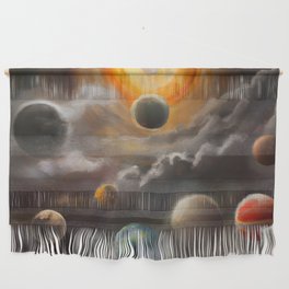 Floating planets in a sea of clouds Wall Hanging