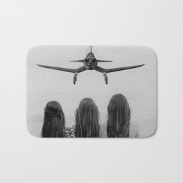 Sisters stand united; airplane coming in for a landing head on at three women sisterhood girl power black and white photograph - photography - photographs Bath Mat