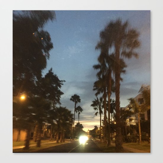Blurry Palm trees in the street Canvas Print