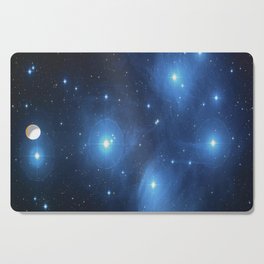 The Pleiades, an open cluster consisting of approximately 3,000 stars at a distance of 400 light years. Cutting Board