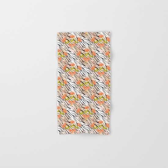 Floral pattern on a tiger background . Hand & Bath Towel