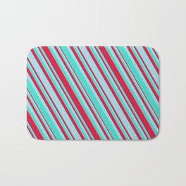 [ Thumbnail: Turquoise, Crimson, and Light Blue Colored Lined Pattern Bath Mat ]