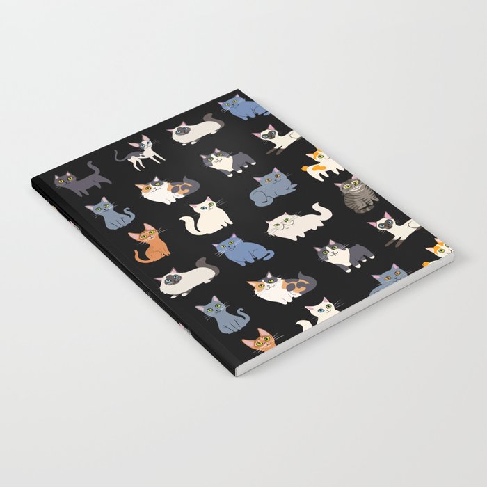 CATS on black Notebook