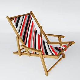[ Thumbnail: Red, Dark Grey, Black, and Mint Cream Colored Lined Pattern Sling Chair ]