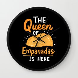 The Queen Of Empanadas Is Here Wall Clock