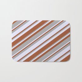 [ Thumbnail: Lavender, Sienna & Dark Grey Colored Lines/Stripes Pattern Bath Mat ]