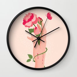 Rose flower with thorns in hand, pain and pleasure Wall Clock