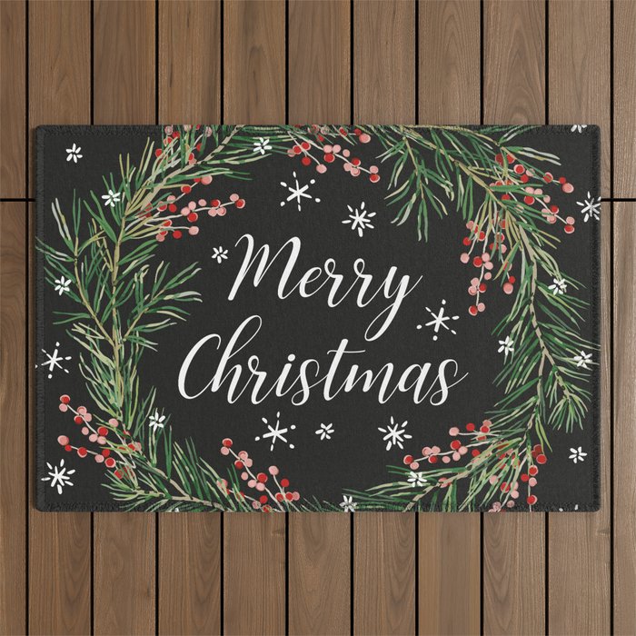 Merry Christmas wreath with berries and snow on the black Outdoor Rug