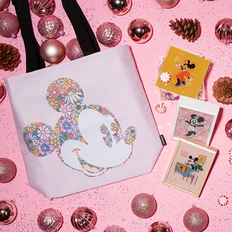 festive flatlay with Mickey Mouse tote bag and Minnie Mouse framed mini art prints