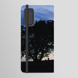 silhouette of a tree at sunrise long exposure Android Wallet Case