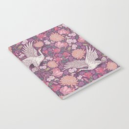 Cranes with chrysanthemums and pink magnolia on purple background Notebook