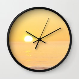 Peachy sunrise seascape Wall Clock