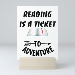 Reading is a ticket to adventure Mini Art Print