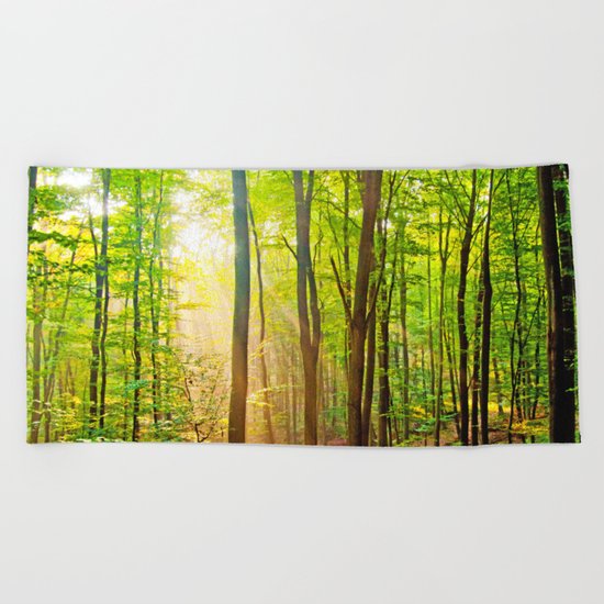 Sunbeams in the forest Beach Towel