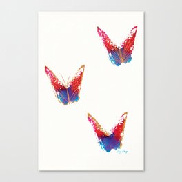 Three abstract red and blue butterflies with copper effect Canvas Print