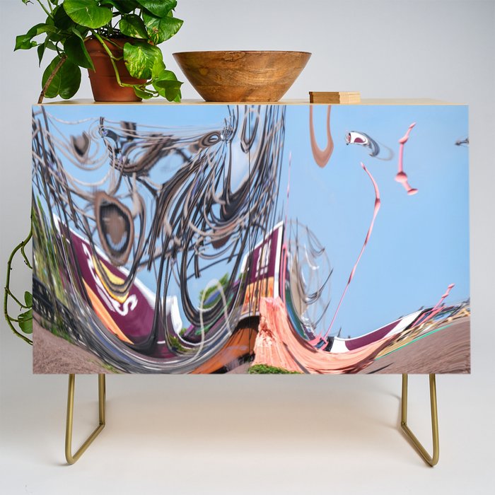 It is a strange world 1 Credenza