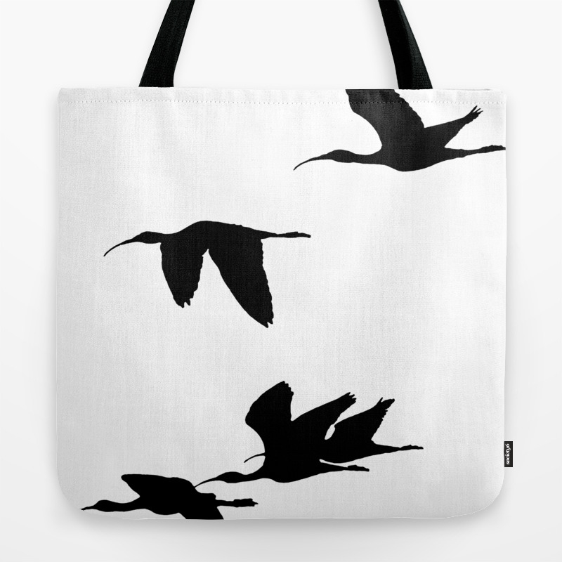 Download Silhouette Of Glossy Ibises In Flight Tote Bag By Taiche Society6
