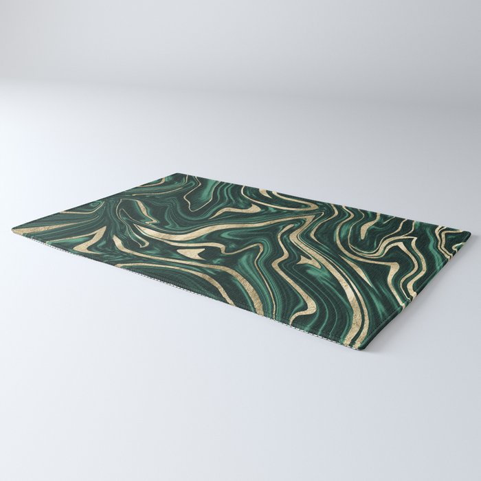 Emerald green and gold flowy marble print on shirts, blankets