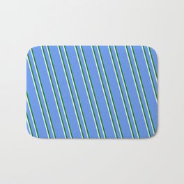 [ Thumbnail: Cornflower Blue, Green & Lavender Colored Lined Pattern Bath Mat ]