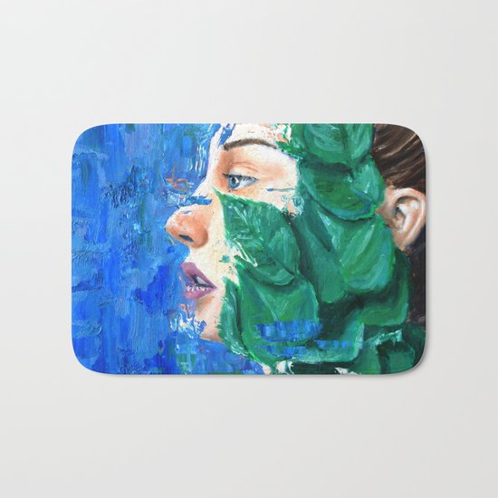 Leaves and face Bath Mat