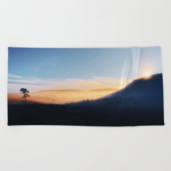 Sunset in the hills Beach Towel