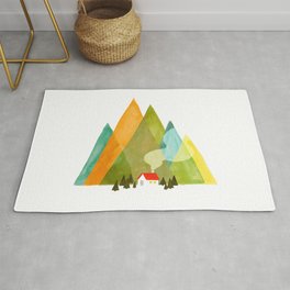 House at the foot of the mountains Rug